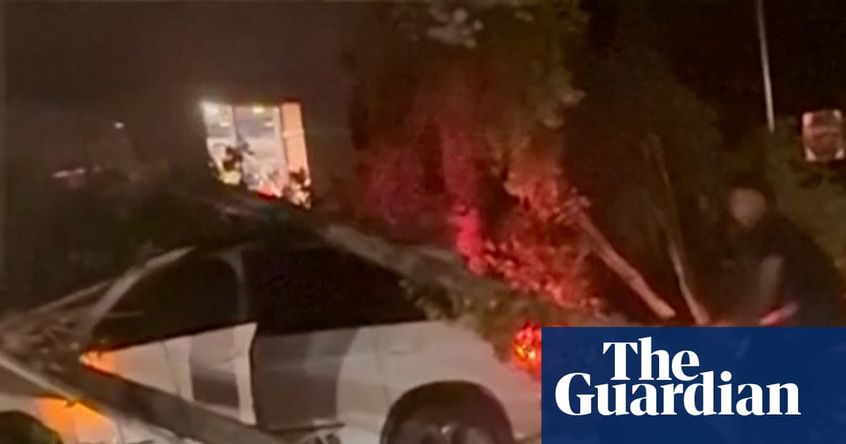 Army football player hailed a hero for saving man from flames after car crash – video