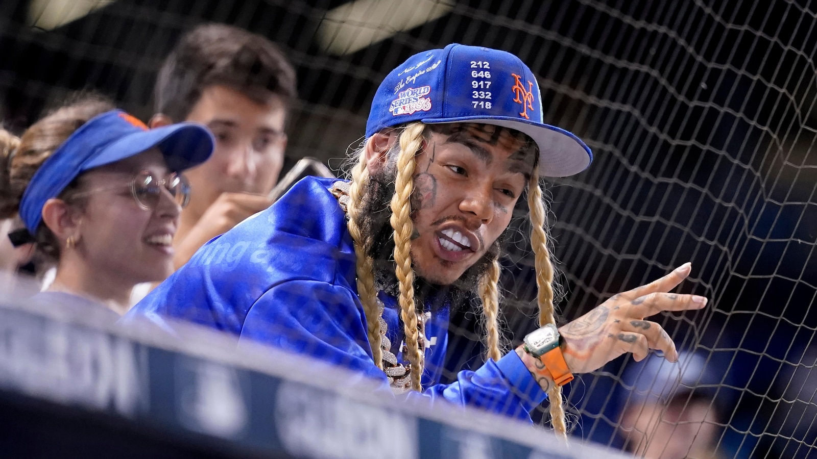 Rapper Tekashi 6ix9ine gets 3 months in prison for violating probation in gang case