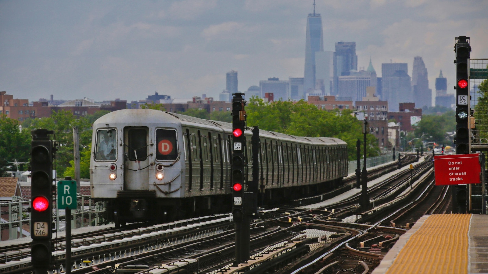 High school student charged with arson in fire that burned subway passenger