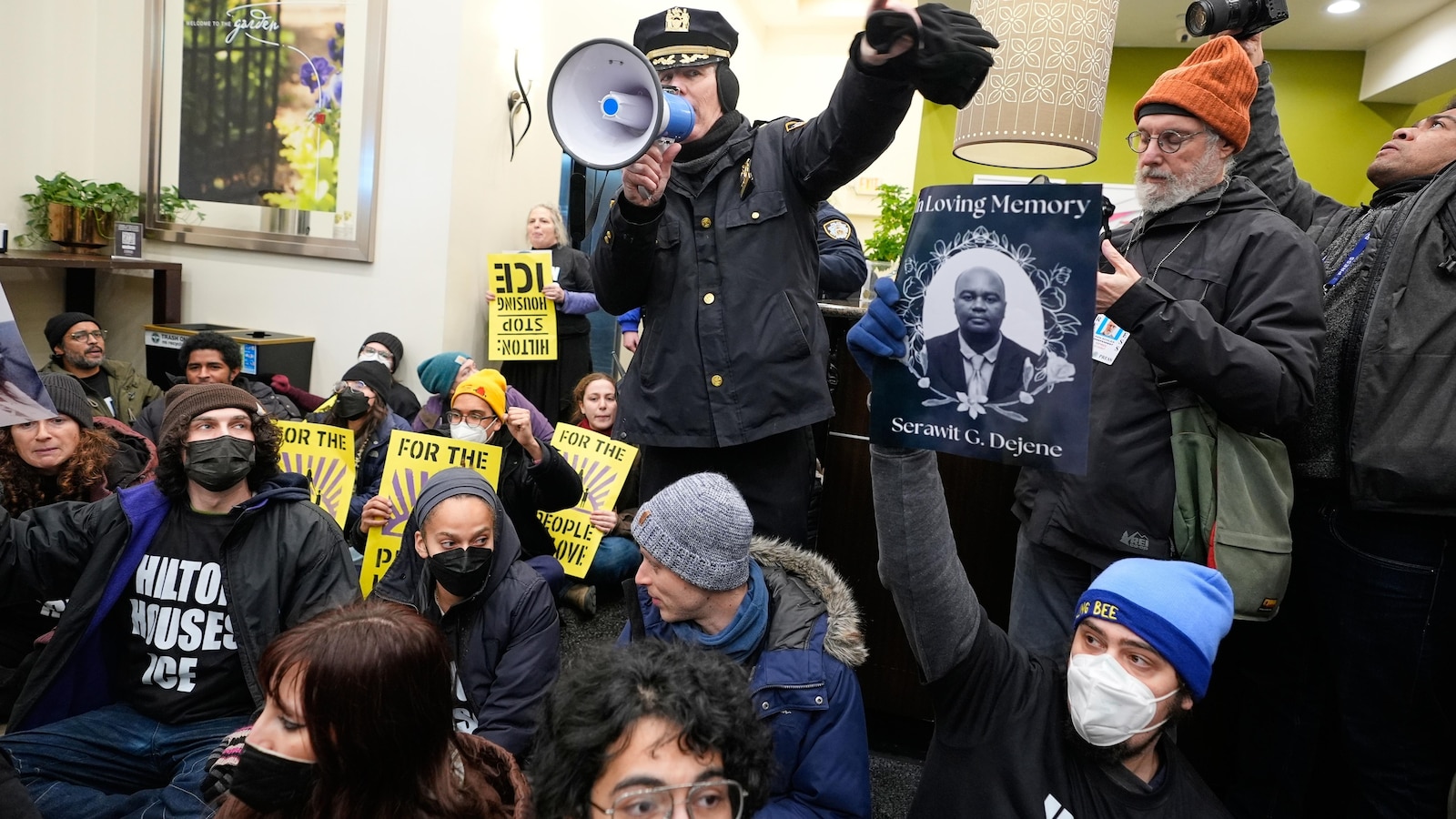 Dozens of protesters arrested at hotel in Manhattan during sit-in over immigration crackdown