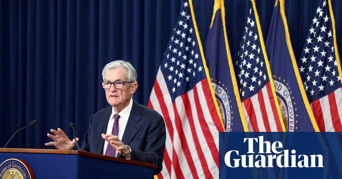 Jerome Powell to stay on Fed board after central bank holds rates steady in defiance of Trump