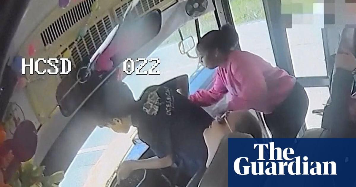 Children stop school bus on Mississippi highway after driver passes out – video