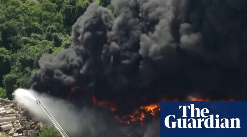 Warehouse fire sends black smoke across Houston sky – video