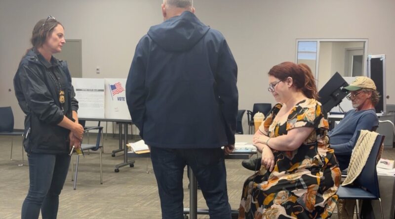 Election worker says federal officers confronted her at polls over social media post criticizing ICE